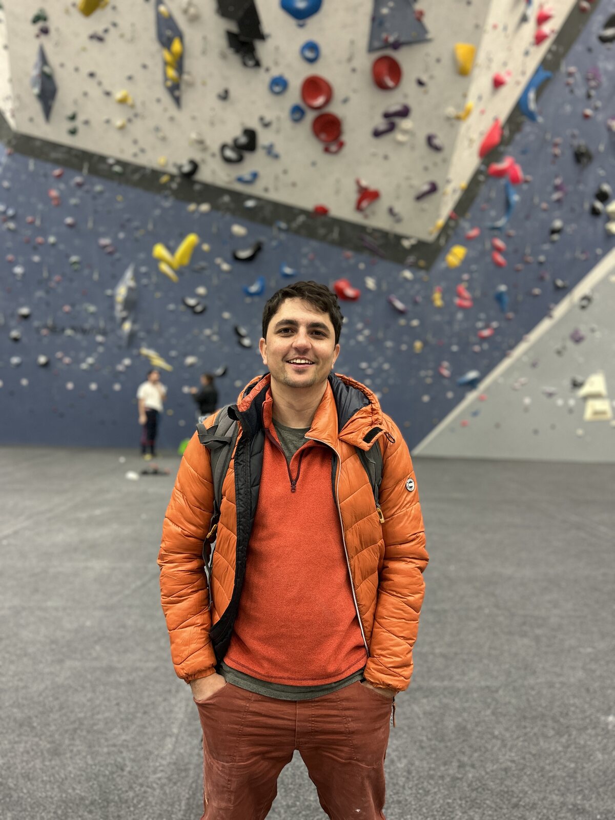 Pablo Bertran, software engineer, at a climbing gym